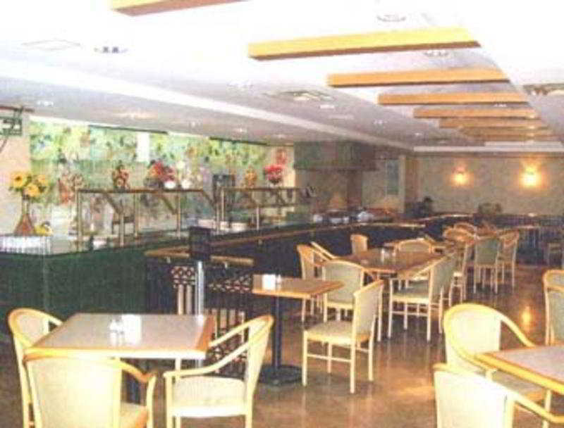 Everest Ciudad Victoria Restaurang bild